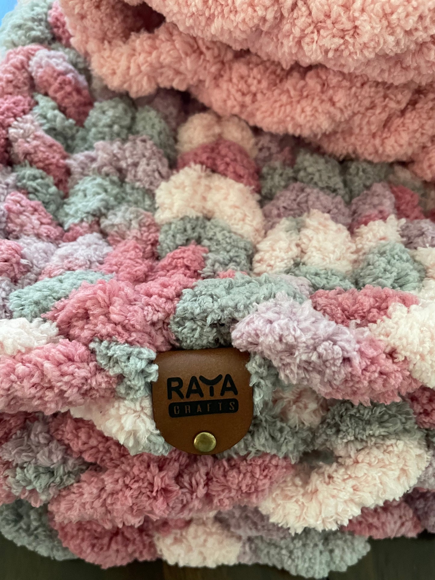 Handmade blanket made with love of 100% soft and cozy polyester chunky chenille yarn, a gift for a cute baby.