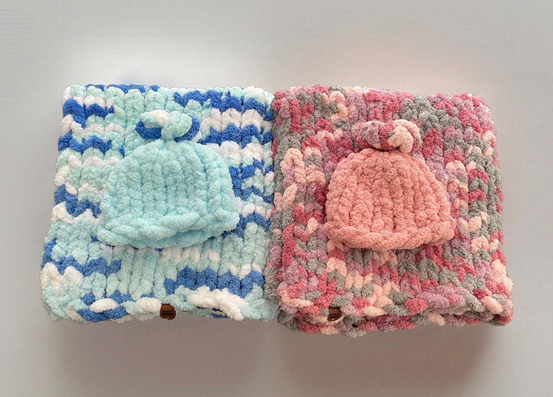 Handmade blanket made with love of 100% soft and cozy polyester chunky chenille yarn, a gift for a cute baby.