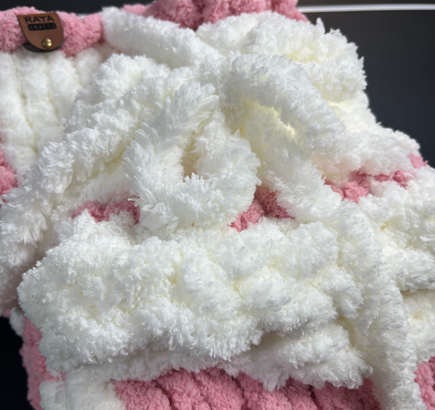 Handmade blanket made with love of 100% soft and cozy polyester chunky chenille yarn, a gift for a cute baby girl.